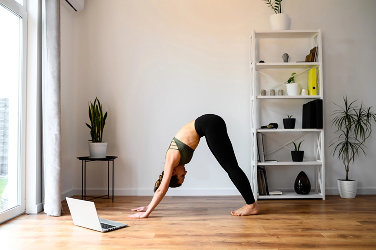 woman in yoga pose stretching